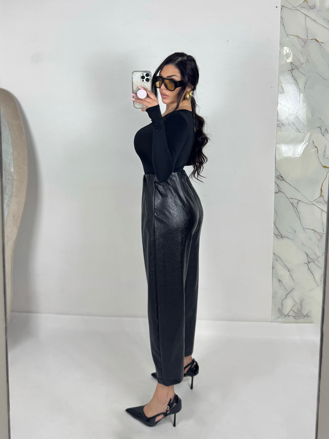 Pantaloni in eco pelle “Carattere”