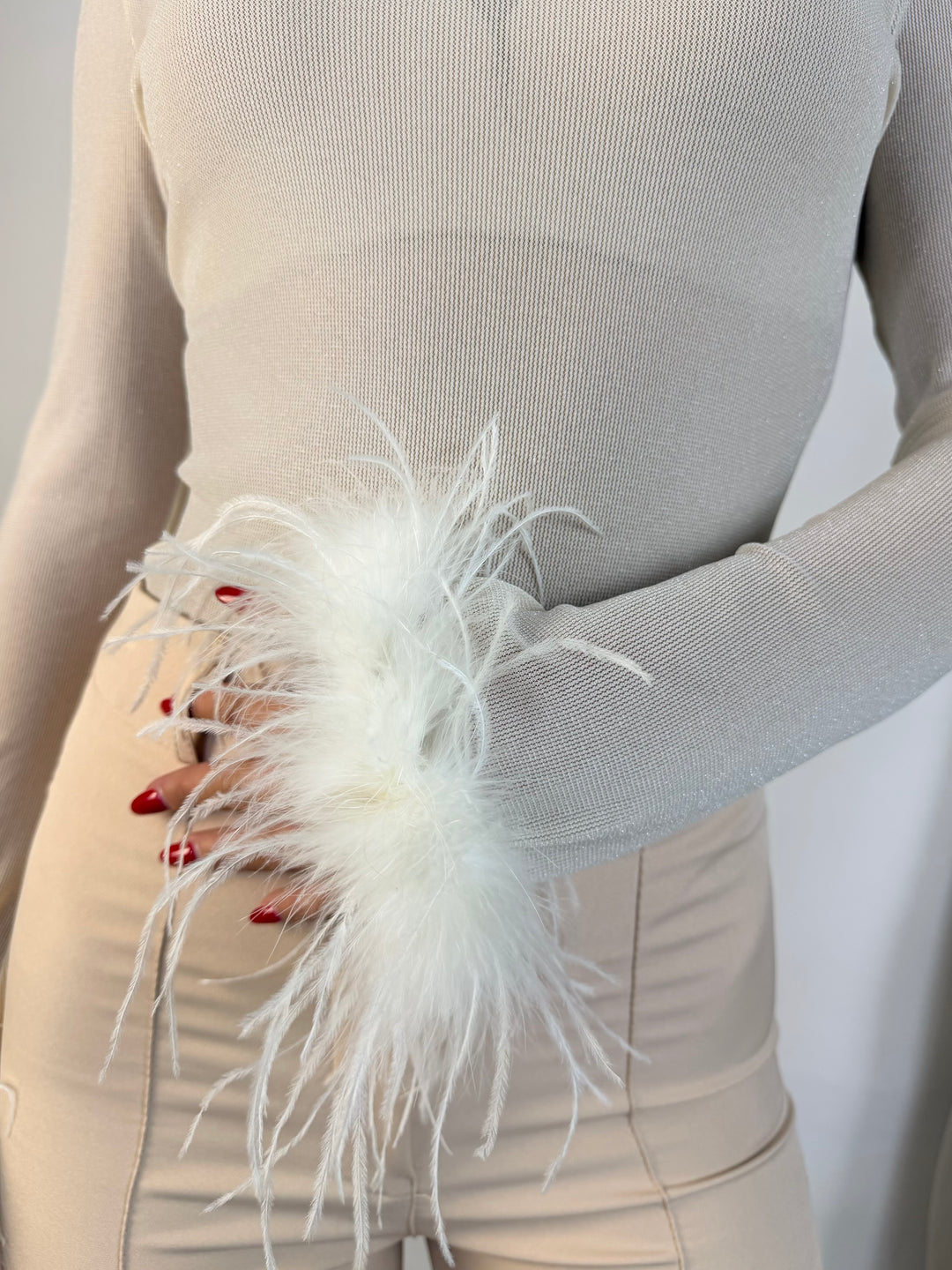 Body in lurex con piume “Sephora”