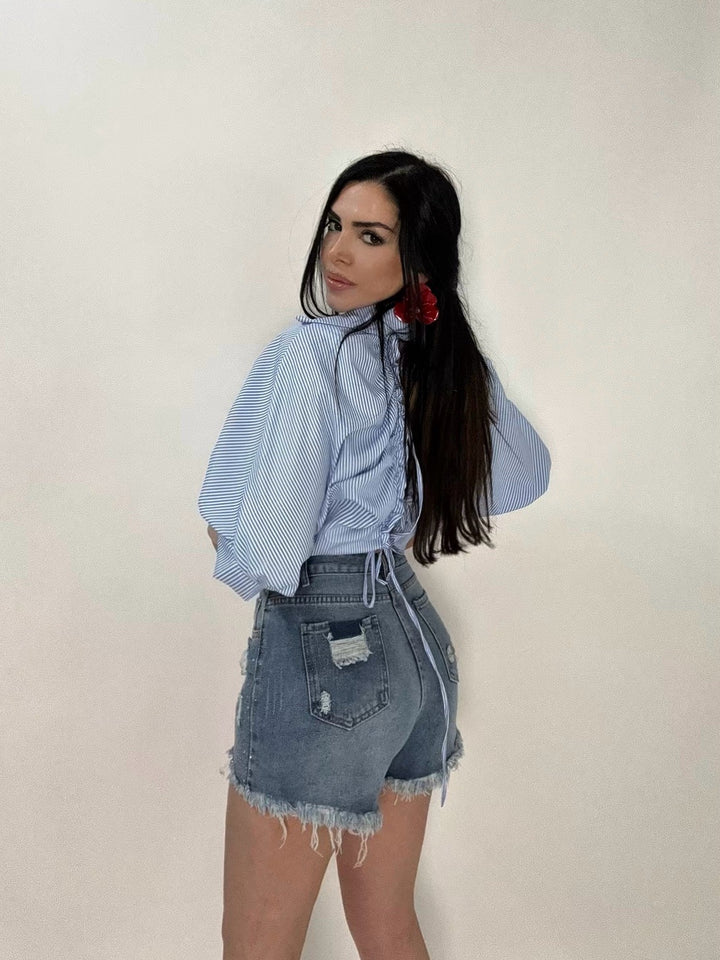 Pantaloncini in jeans con strass e strappi “Alexia”