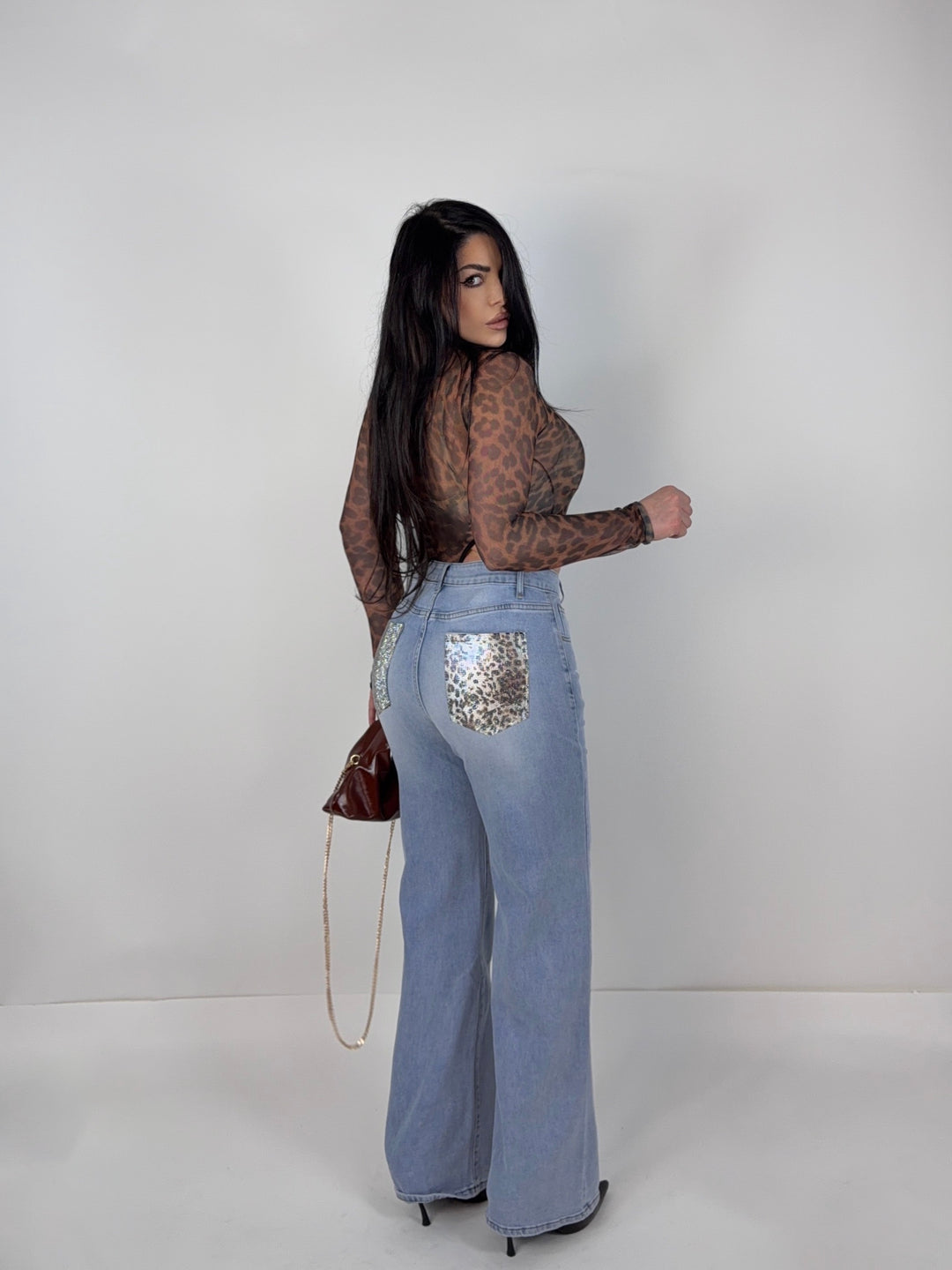 Jeans wide leg con tasche strass “Jungle”