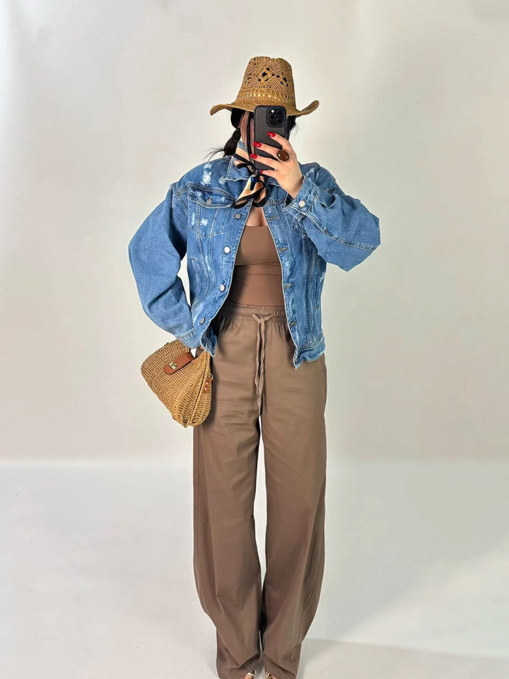 Giubbotto bomber in jeans con strappi “Riviera”