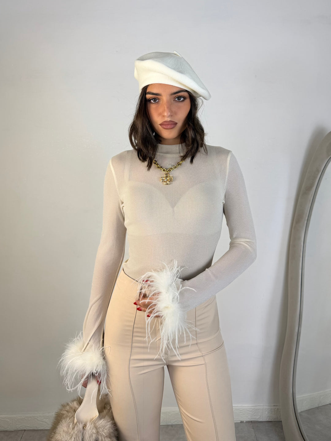 Body in lurex con piume “Sephora”