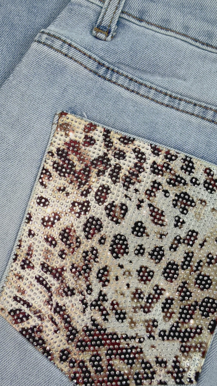 Jeans wide leg con tasche strass “Jungle”